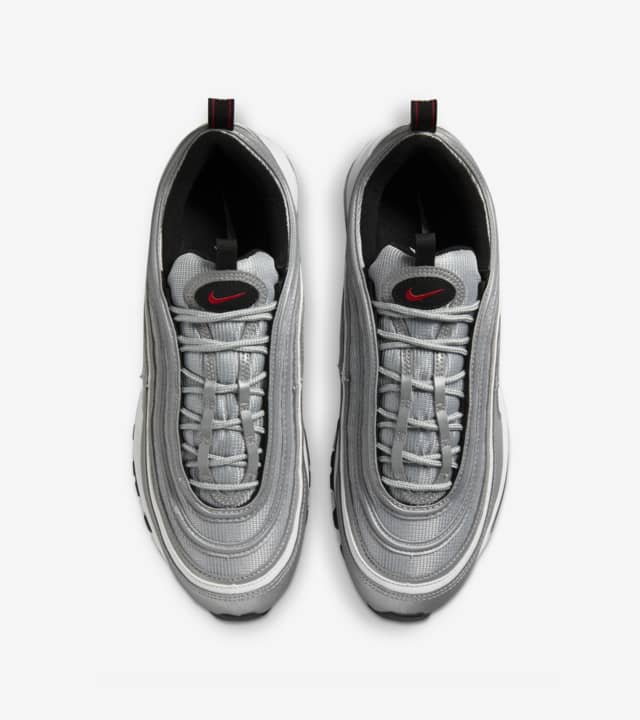 Air Max 97 OG shoe - Nostalgic design with vibrant colors and a wavy mesh pattern.