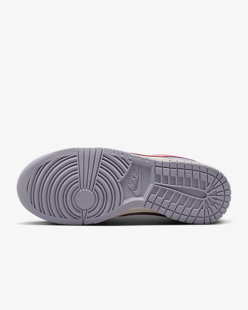 Nike Women's Dunk Low shoe in INDIGO HAZE/CORAL CHALK-SAIL