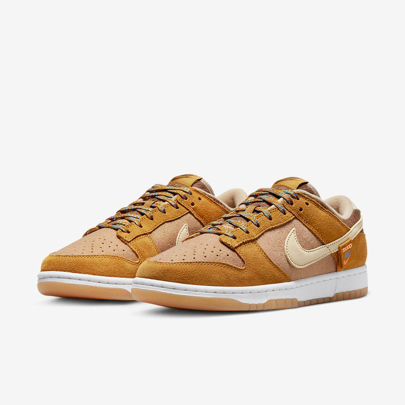 Nike Dunk Low SE - Timeless design with premium materials. Cool neutrals and pops of colour.